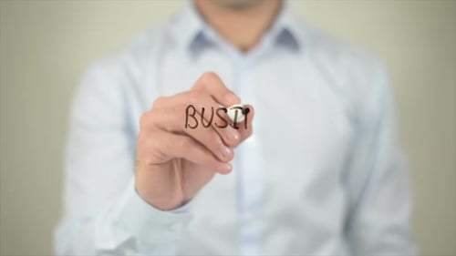 Man Writes Business Administration Concept