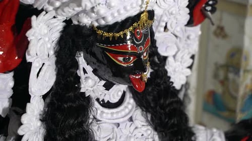 Deity Statue with Black Face and Gold Crown