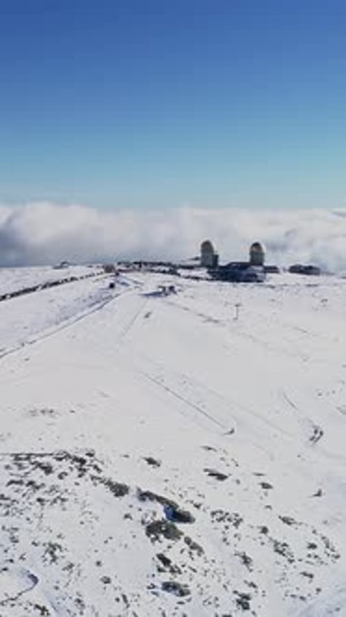 Vertical Video of Snow Mountains Winter in Torre Serra da Estrela, Portugal