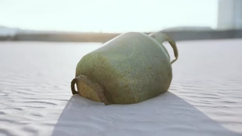 Old Rusted Metal Gas Tank on the Beach