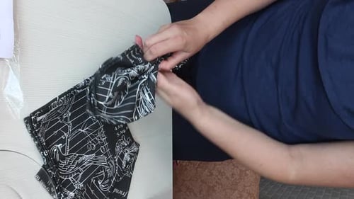 Adult Folding Napkin with Ring on Plate