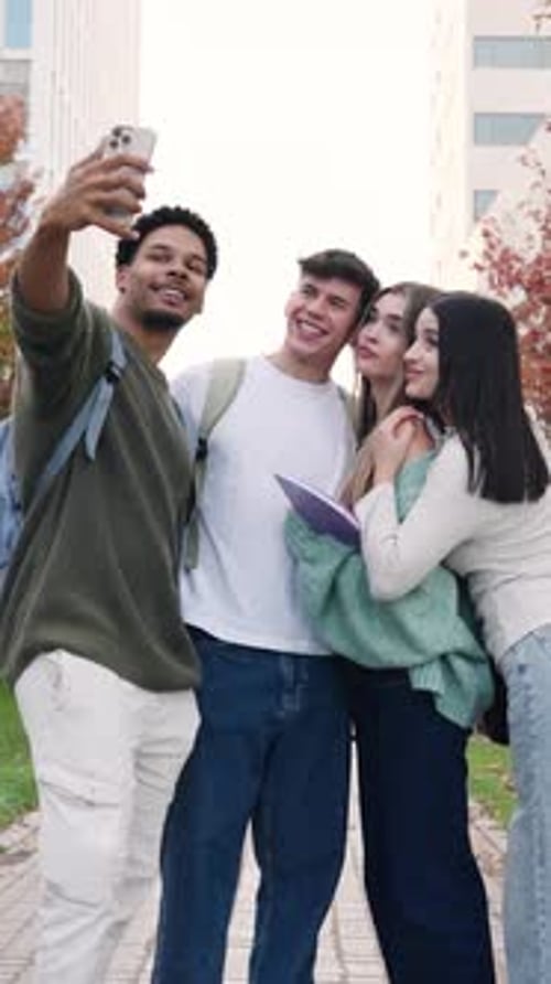Diverse Group of College Students Taking a Selfie on Campus Vertical