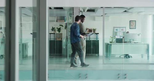 Walking, tablet and planning with business people in office for teamwork