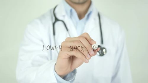 lower back pain, Doctor writing on Transparent Screen