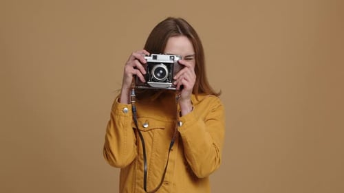 Closeup Shot of Female Photographer Looking at Camera