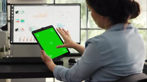 Specialist Checking Blank Greenscreen
