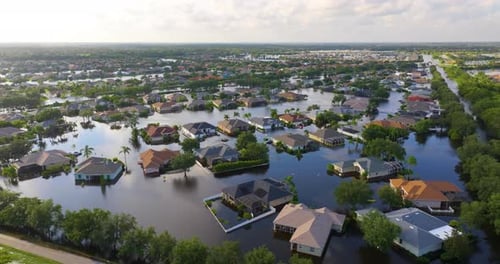 Flooded Houses From Hurricane Rainfall Water in Florida Residential Community Aftermath of Natural