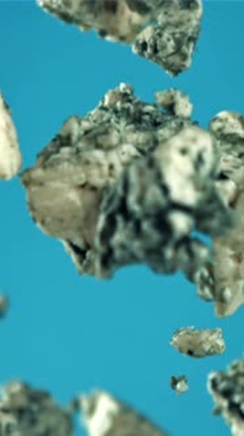 Super Slow Motion Blue Cheese Flies Up and Falls Down Filmed on a Highspeed Camera at 1000 Fps