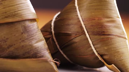 Wrapped Zongzi Bundles Secured with String