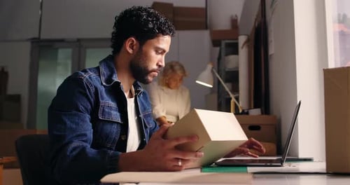 Ecommerce, laptop and box with man in warehouse for delivery information