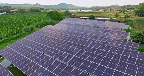 Aerial View of Solar Panels in Rural Setting