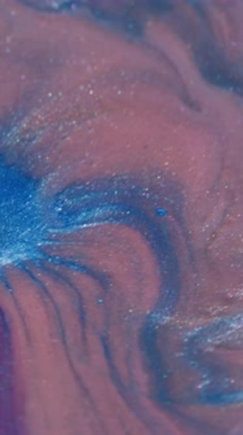 Swirling Blue and Pink Liquid Abstract Background Zoom