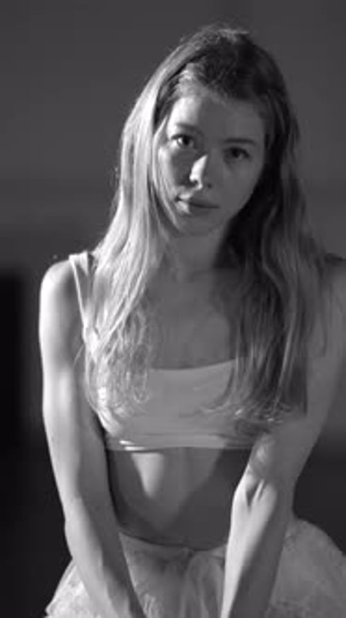 Young Woman in Crop Top and Tulle Skirt