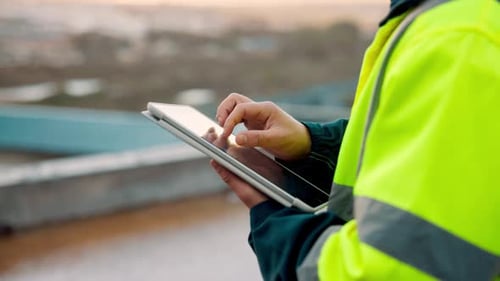 Architect, scroll and hands with tablet at building site, search and safety inspection update