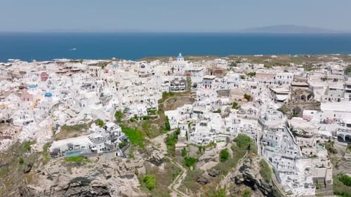 Aerial view of churches and other buildings in Oia, Santorini, Greece