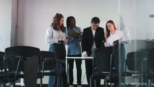 Business Team Discussing Project in Modern Office