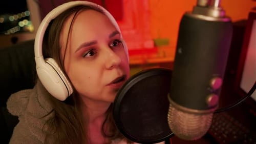An Attractive Female Is Having A Conversation And Recording A Podcast Live On Social Media A Blogger