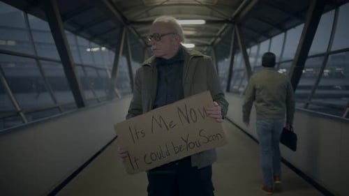 Elderly Homeless Man Suffering From Poverty Looking for Help at Train Station