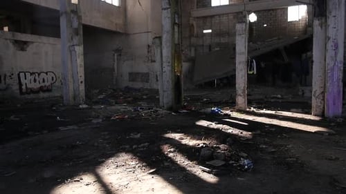 Destruction and debris in crumbling halls, abandoned scary place - urban exploration (slow motion)