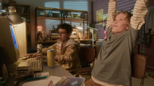 Two Boys Play on Retro Computer in Cozy Room