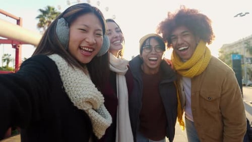 Multiracial Tourist Friends in Winter Clothes Enjoying Vacation in Barcelona