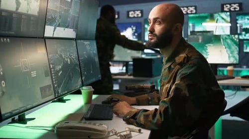 Army Specialist Overseeing National Safety Operations with Devices Close Up