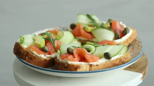 Delicious Salmon Toasts with Cucumber and Avocado