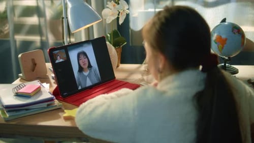 Student Learning Remotely on a Tablet