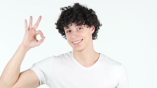 Smiling Man Gives OK Hand Gesture