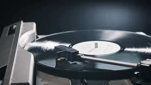 Placing Needle on Spinning Vinyl Record