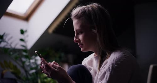 Woman Using Mobile Phone Browsing Social Media