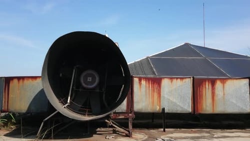 Rooftop of industrial building with heating ventilating and air conditioning units. Industrial exhau