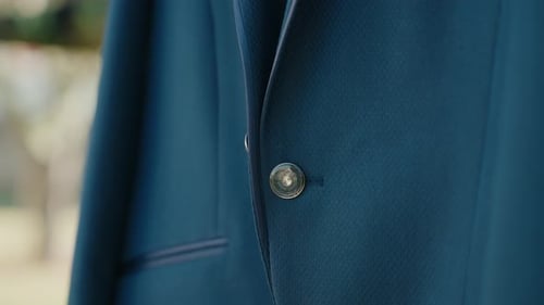 Close Up of a Buttoned Dark Blue Jacket