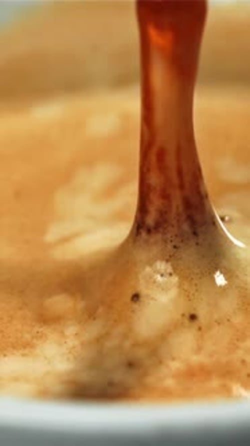 Falling Drop in a Cup of Coffee Filmed on a Highspeed Camera at 1000 Fps
