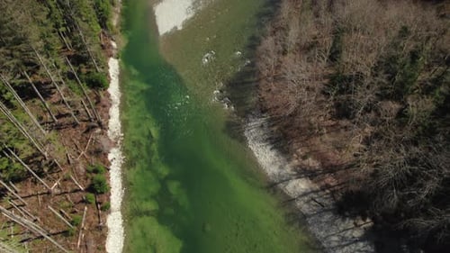 Drone Transition From Green River To Mountain With Blue Sky