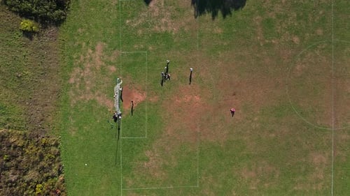 Top View Soccer Practice With Kids Playing On Sunny Day In Halifax Summer Field