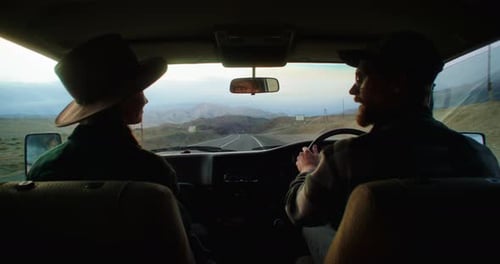 Couple Driving on a Scenic Road Enjoying Road Trip Adventure in Altai Russia