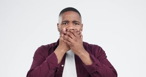 Scared, surprise and face of black man in studio isolated on white background with announcement