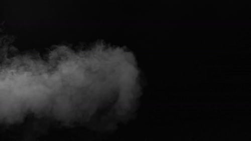 Smoke Filling Frame on Black Background