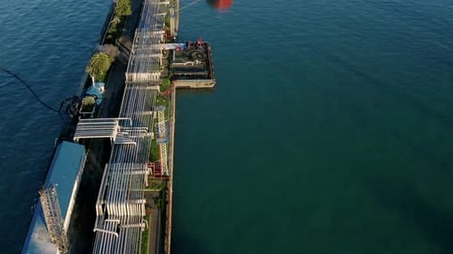 Aerial View Oil Ship Tanker Vessel Loading in Gas and Oil Terminal Station Refinery Global Trading