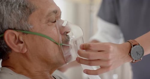 Patient Receiving Oxygen Therapy in Hospital Close-Up