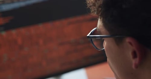 Man, reading and code with HTML on computer screen for software development