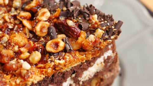 Delicious Chocolate Cake Slice with Nuts and Caramel