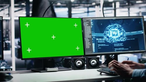 Data Center Engineer Working on Neural Network on Green Screen PC