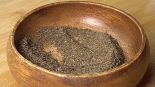 Close Up Ground Pepper Being Scooped