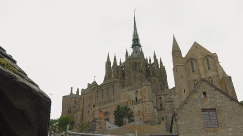 Side view of Mont Saint-Michel on a cloudy day, Manche, France
