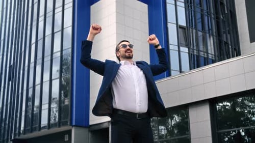 Happy Business Man Celebrate Win Victory Financial Deal Success Raising Hands Downtown Office Street