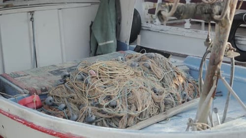 An Empty Fishing Net in a Fishing Boat