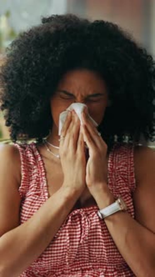 Woman Using Tissue for Cold or Allergies