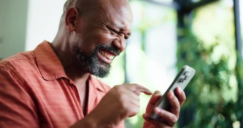 Winner, fist pump or black man in lounge with phone, giveaway or award announcement in online